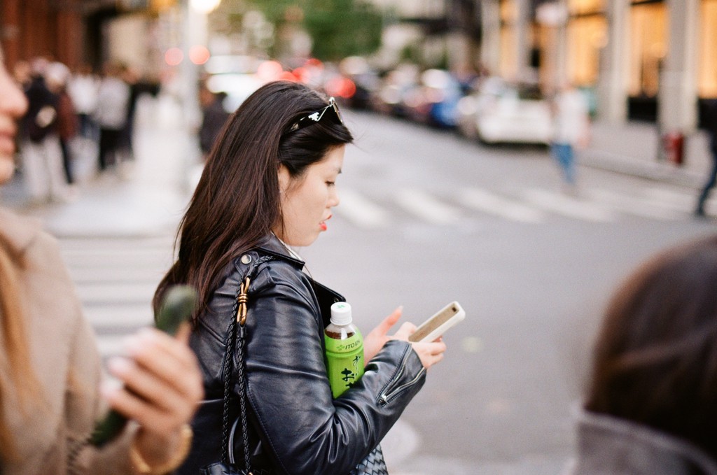 Tourist taking selfie at landmark