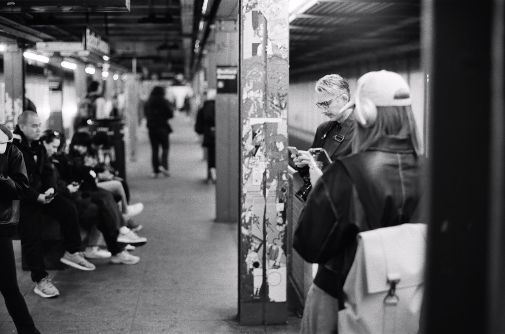 The subway is a great place to practice boredom, but most people are glued to their phones