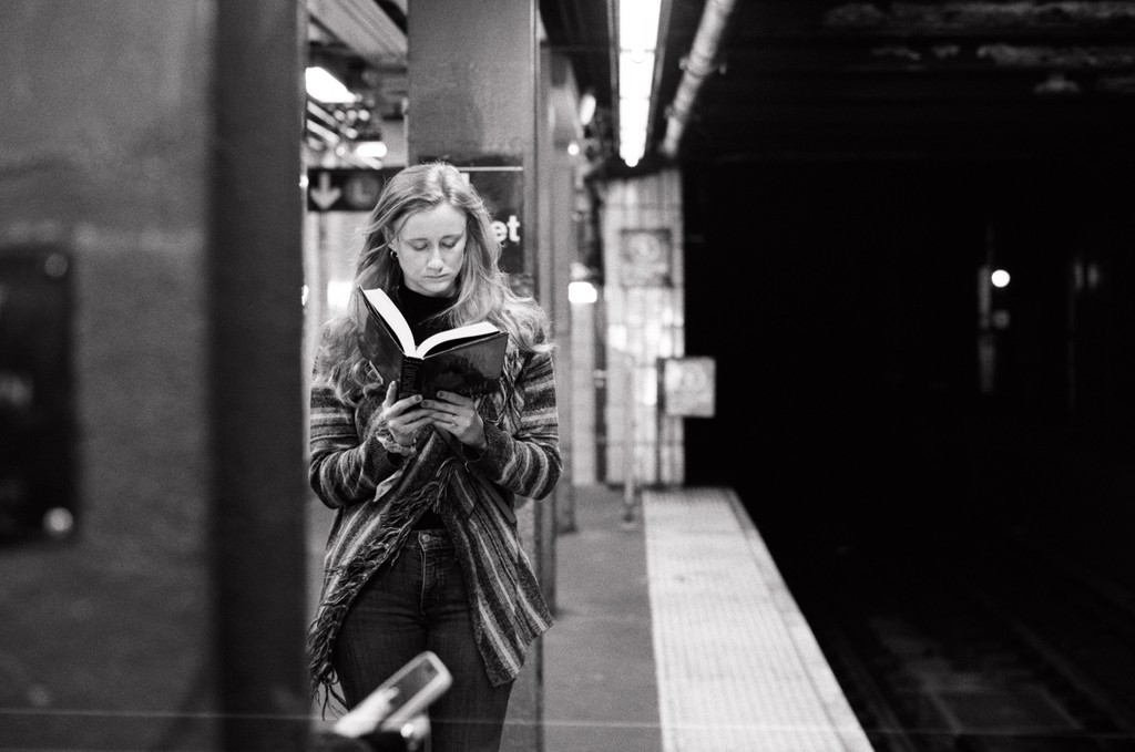 A person reading a physical book